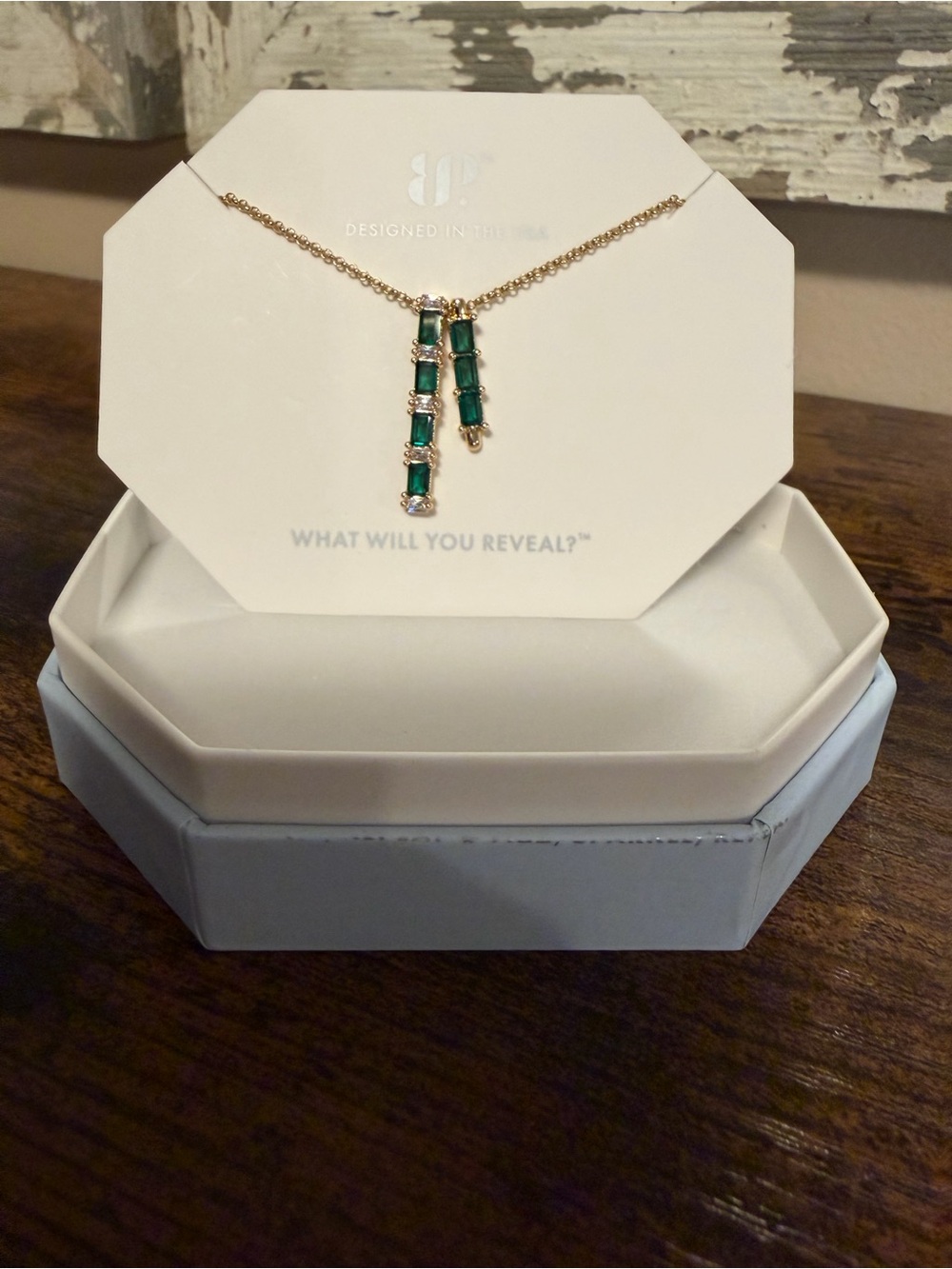 Bomb Party Gold-Tone Layered Necklace with Emerald Green Baguette Stones